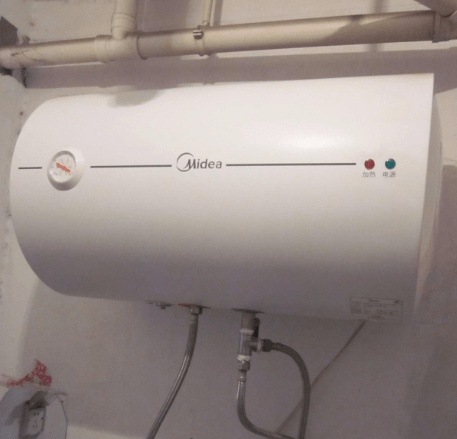 电热水器六年未清洗水垢糊满加热棒和内胆
