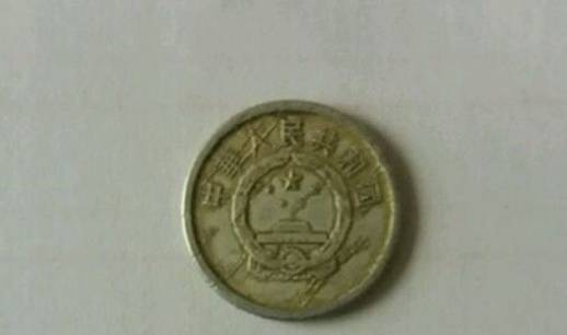 硬币五十猜一个成语_一个亿硬币(3)