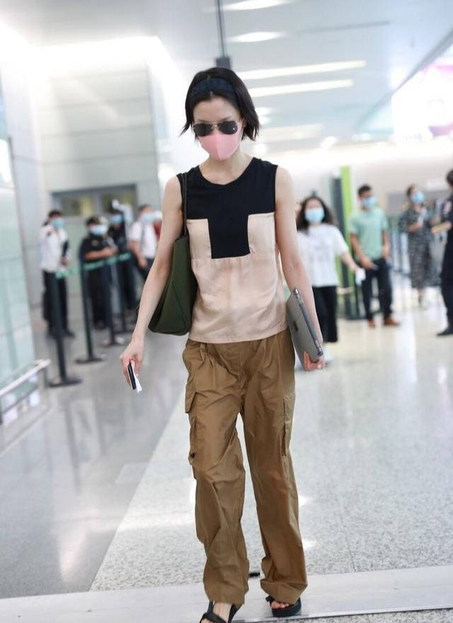 怎么穿衣服显气场 91b26db1664c4538856817d0b2d3c979.jpeg