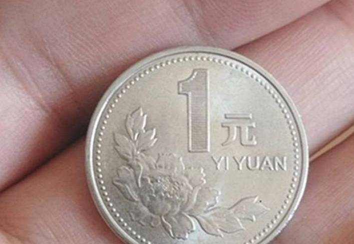 一个一元硬币一个屎字猜成语_一元硬币