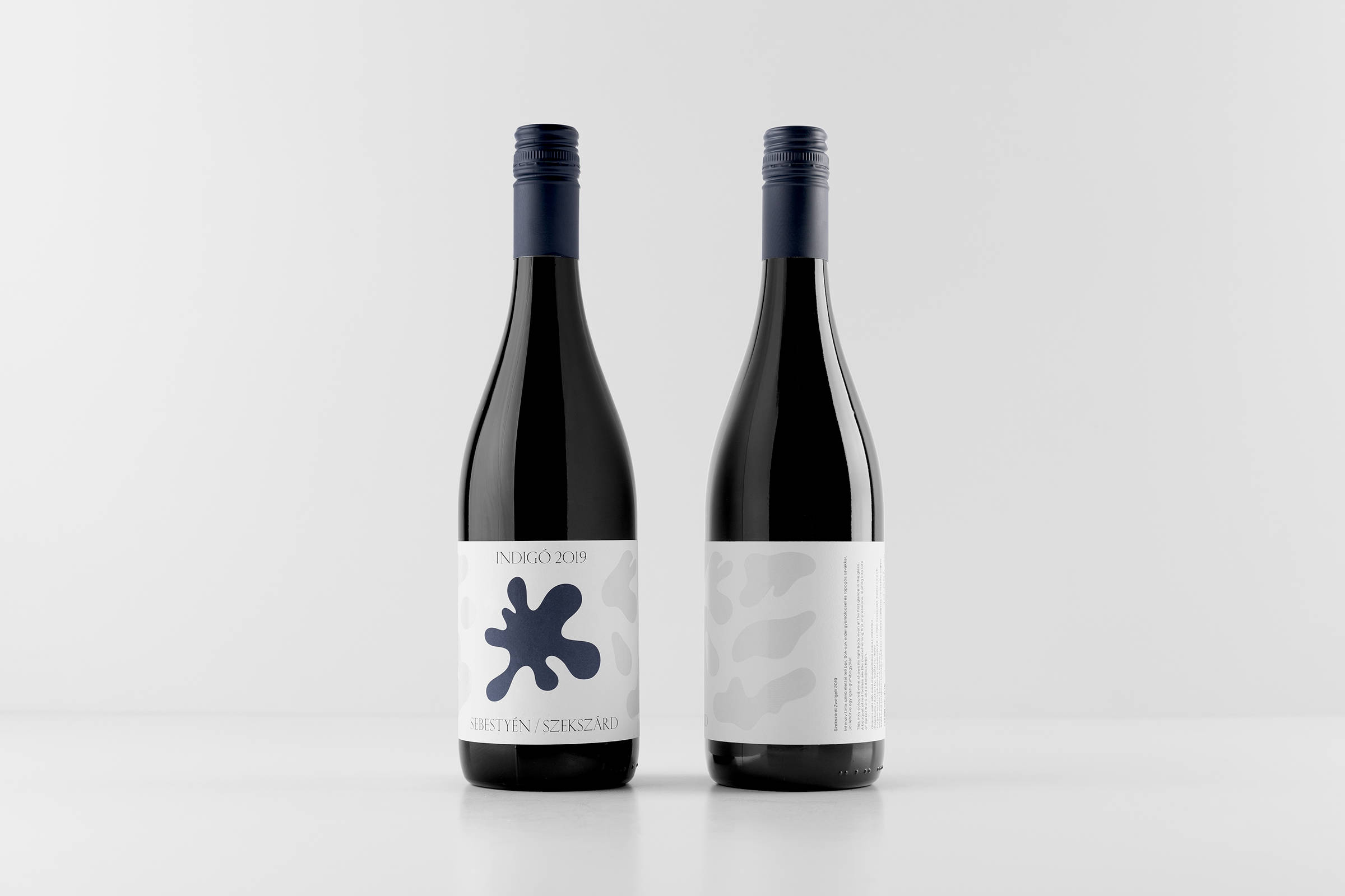 抽象化设计风格与独特形状相互搭配的葡萄酒包装设计