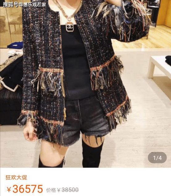  . 47岁牛莉穿开叉长裙走出六亲不认步伐 身材养眼气场两米八（图）