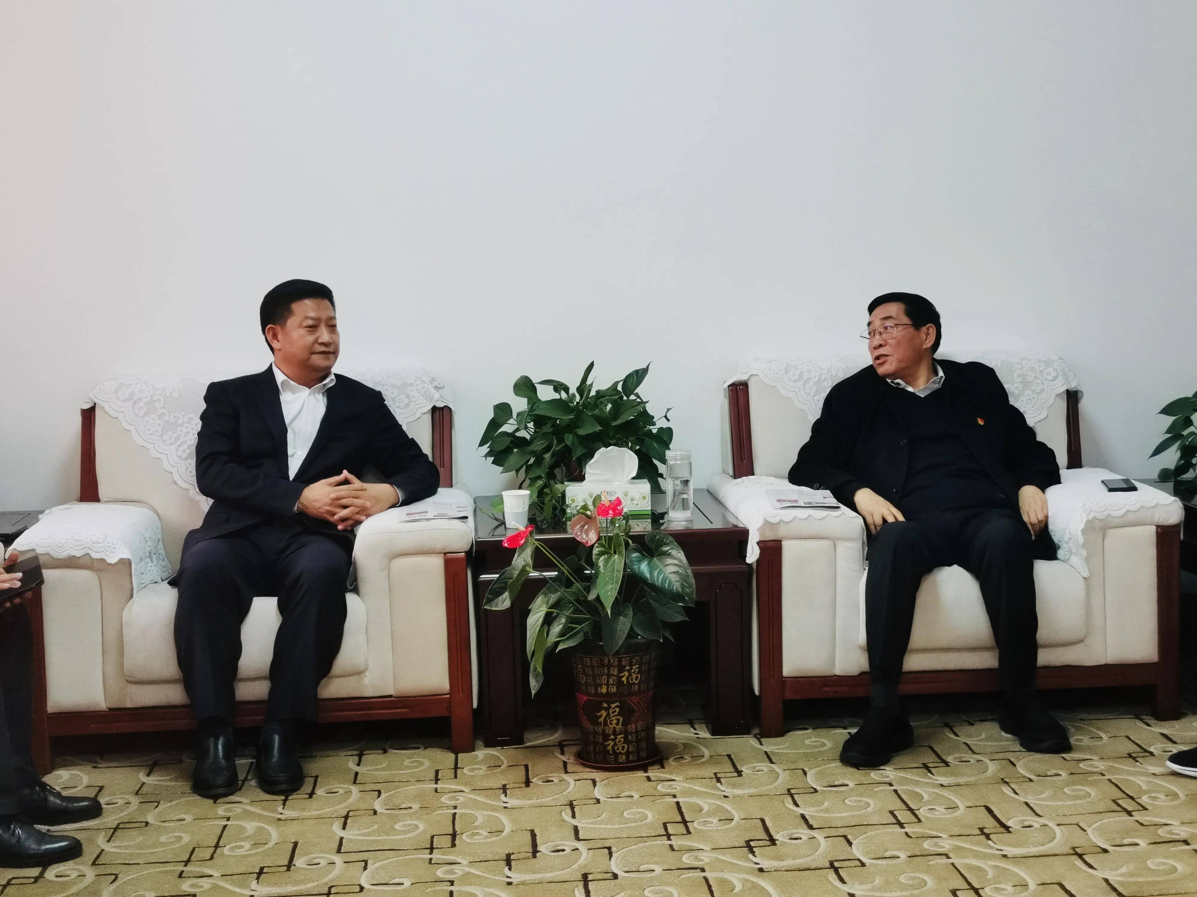 单恒伟携泛华集团拜会南阳市委书记张文深