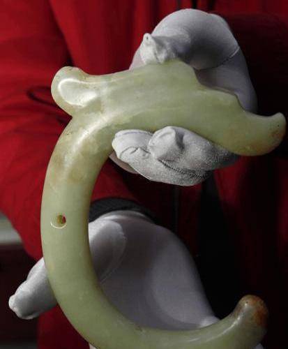 【被誉为华夏第一龙的红山玉龙】 一、龙图腾的由来龙这种事物,最早的记