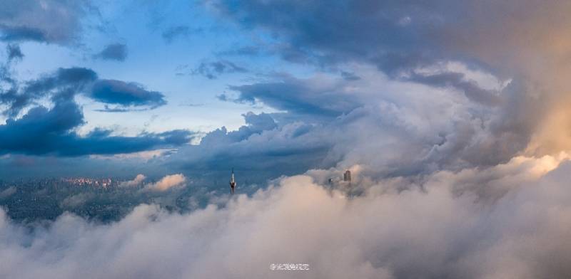美爆了！在珠江新城“飞”的航拍大神带你穿越云层捕捉广州塔_杜华