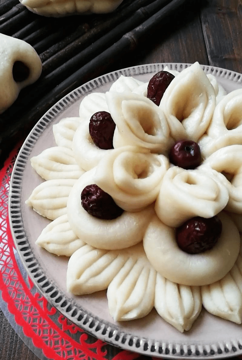 其他地方也有蒸年馍,图吉祥的说法.