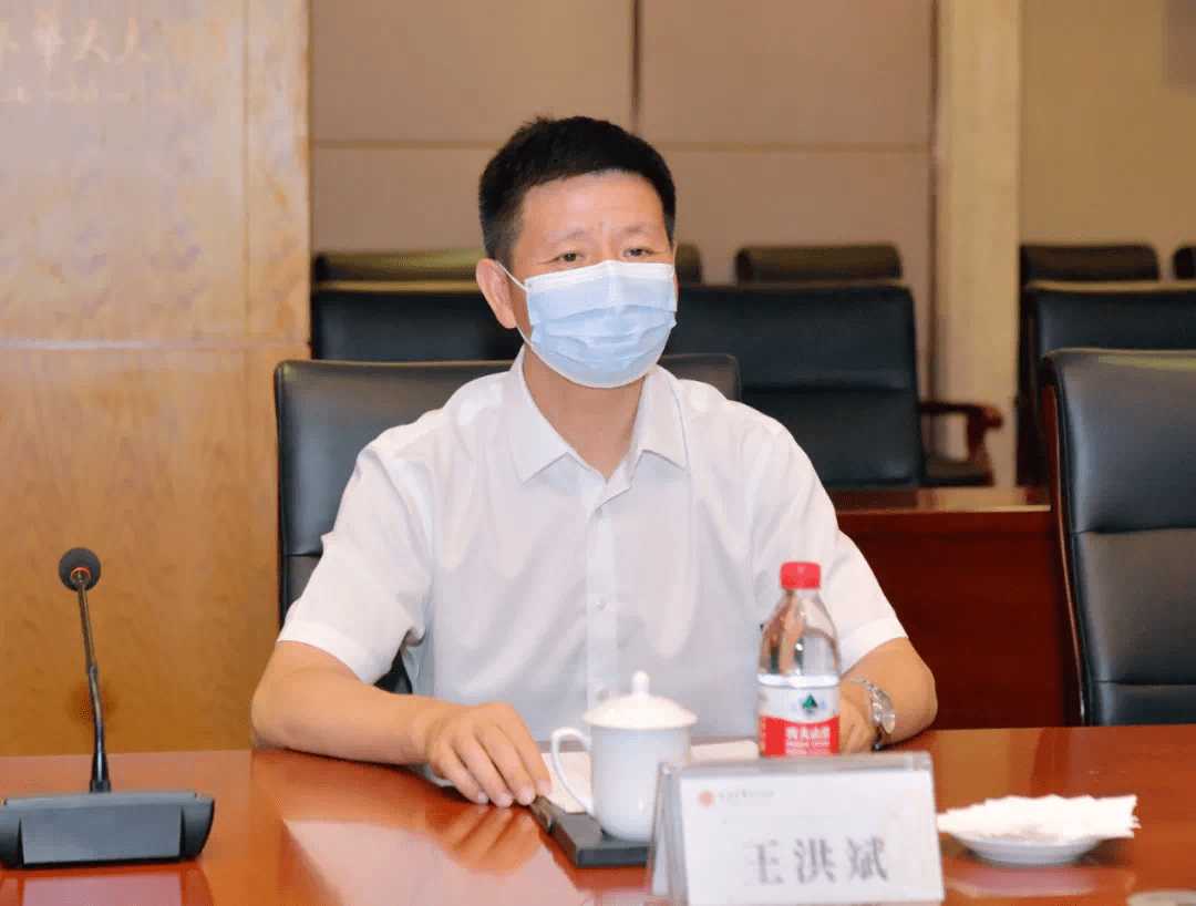 王洪斌会见李根植一行_张家界市