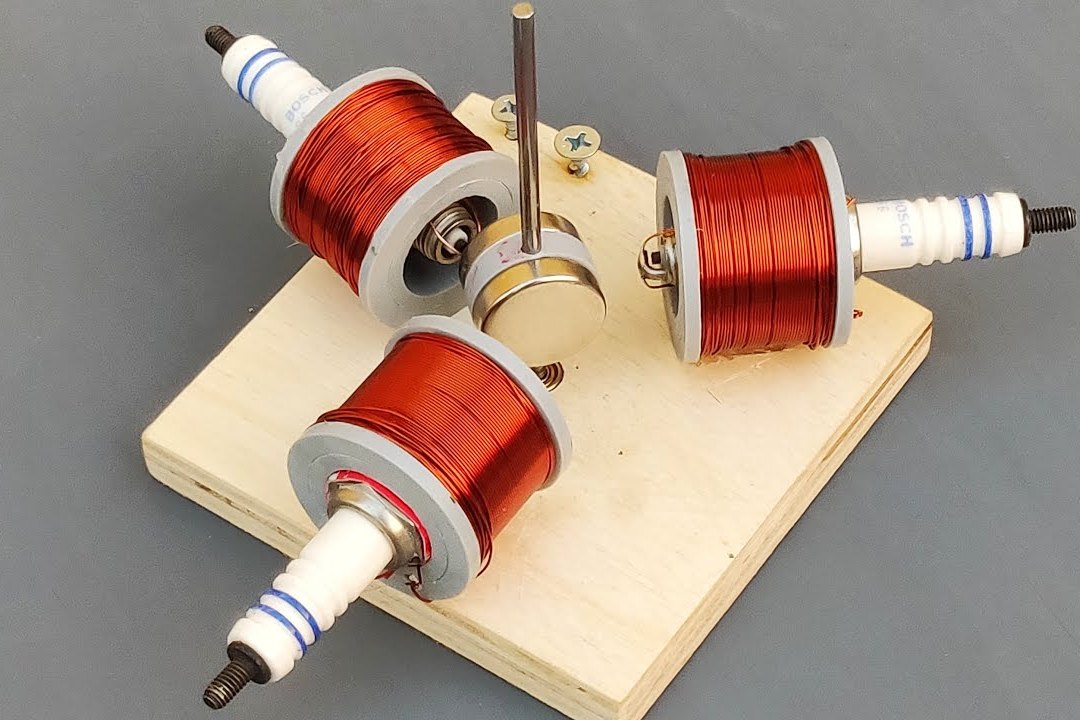 铜线缠绕火花塞上制作的电磁线圈通过磁铁就能发电