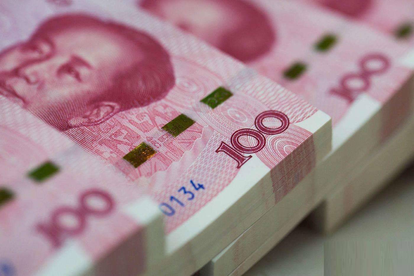 美媒：人民币正度过比美元更好的年份