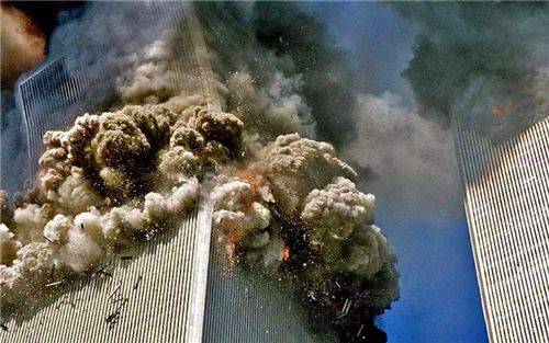 "911事件"最经典的照片:小布什获知恐袭瞬间,2016年才被解禁_世界贸易