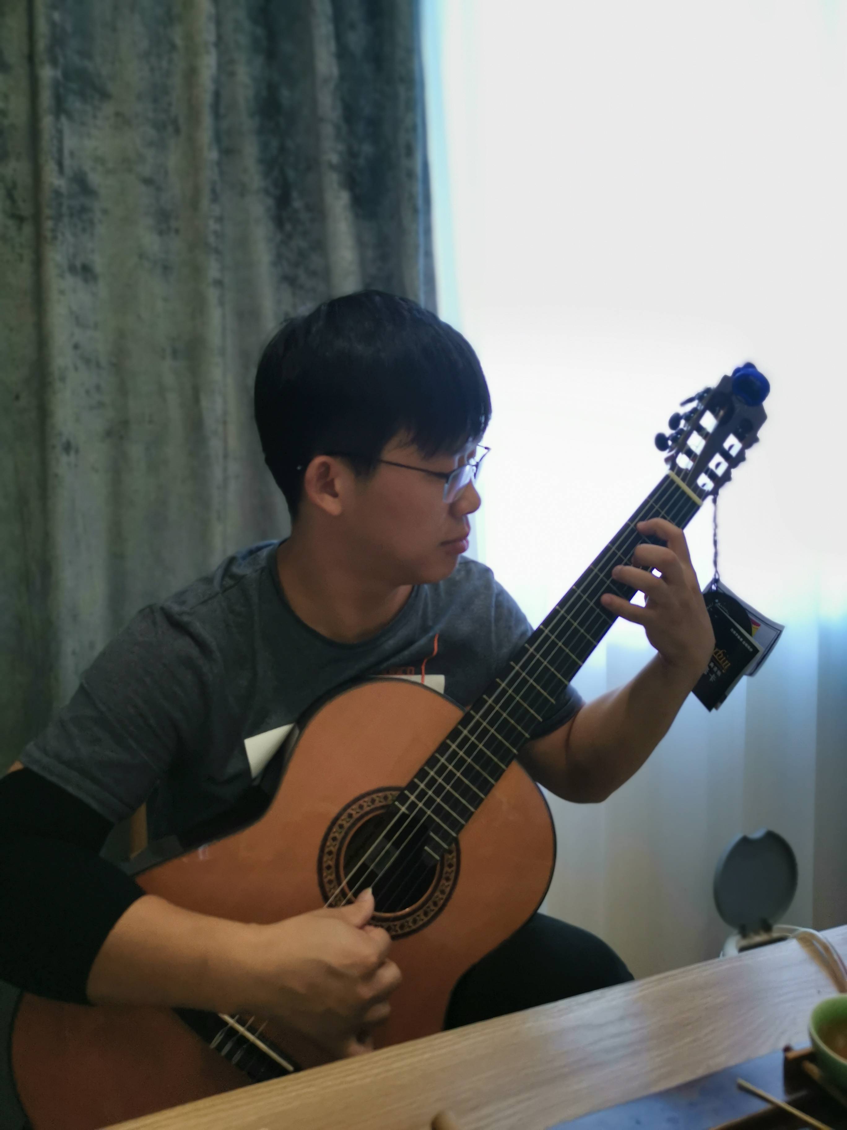 怎样调整你的木吉他