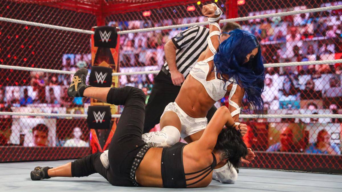 罗曼领袖地位获家族长老认可,莎夏三进wwe地狱牢笼终得凯旋归!