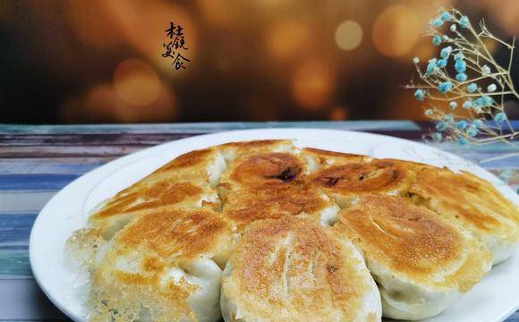 怎么做水煎包的馅最好吃 2c5da0cf0bd0438e92fc79da35b023af.jpeg