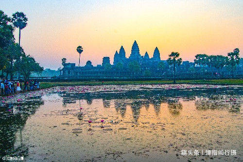 柬埔寨吴哥窟最美日出：当橙黄晨光笼罩古老遗迹，美得难以言表