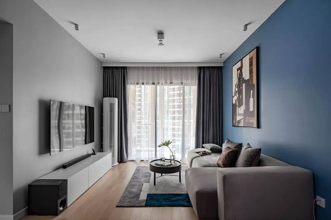 客厅瓷砖上墙搭配灰色沙发 4770c1b9b124436984ac1f5328e339fa.jpeg