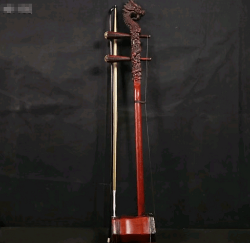 《怀麓堂集》内写到"囚牛,龙种,平生好音乐,今胡琴头上刻兽是其遗像