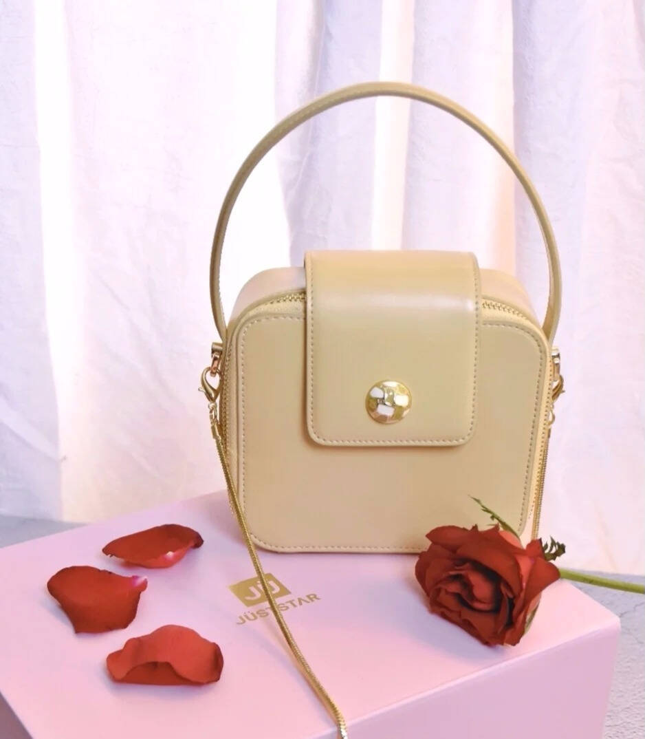 欧时纳小众牛皮斜挎包,简约甜美却不失设计感