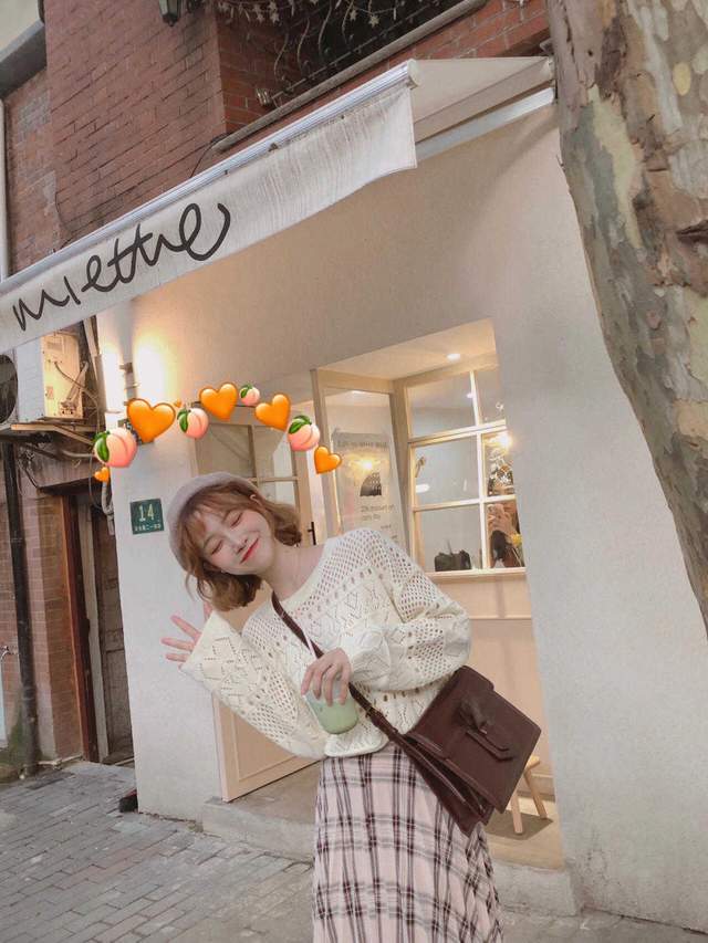 的作用 今秋怎么穿才漂亮?“格子裙+针织衫”简约洋气,美出了新高度