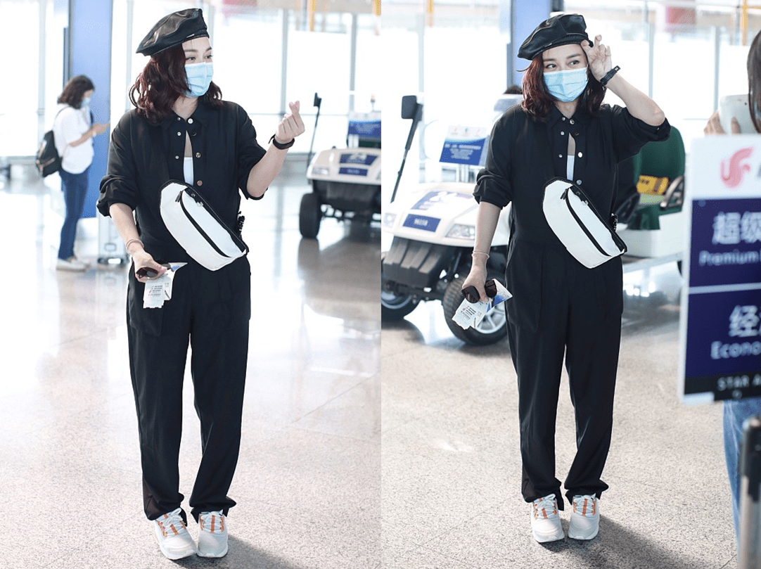 陈松伶 虽然陈松伶这妆化得太浓了,但是配黑衣却显得刚好,不怎么俗气