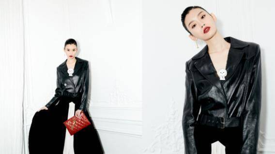 卫衣 奚梦瑶不愧是模特出身,上衣和裙子用圆环挂着,腰线超抢眼的