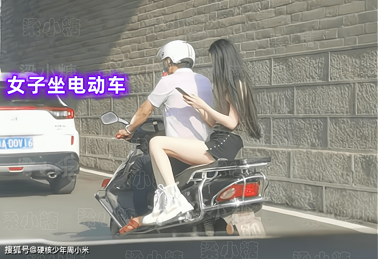 女孩坐男生电动车感受图片