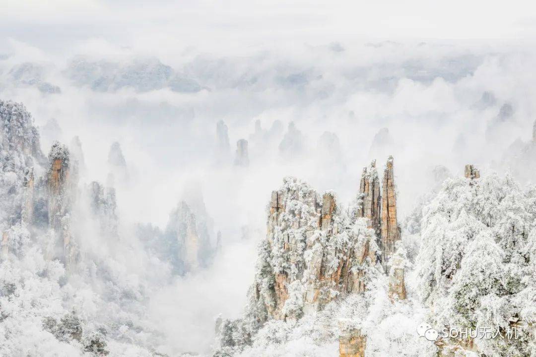 原创覃光辉痴迷在皑皑雪色中记录世界遗产