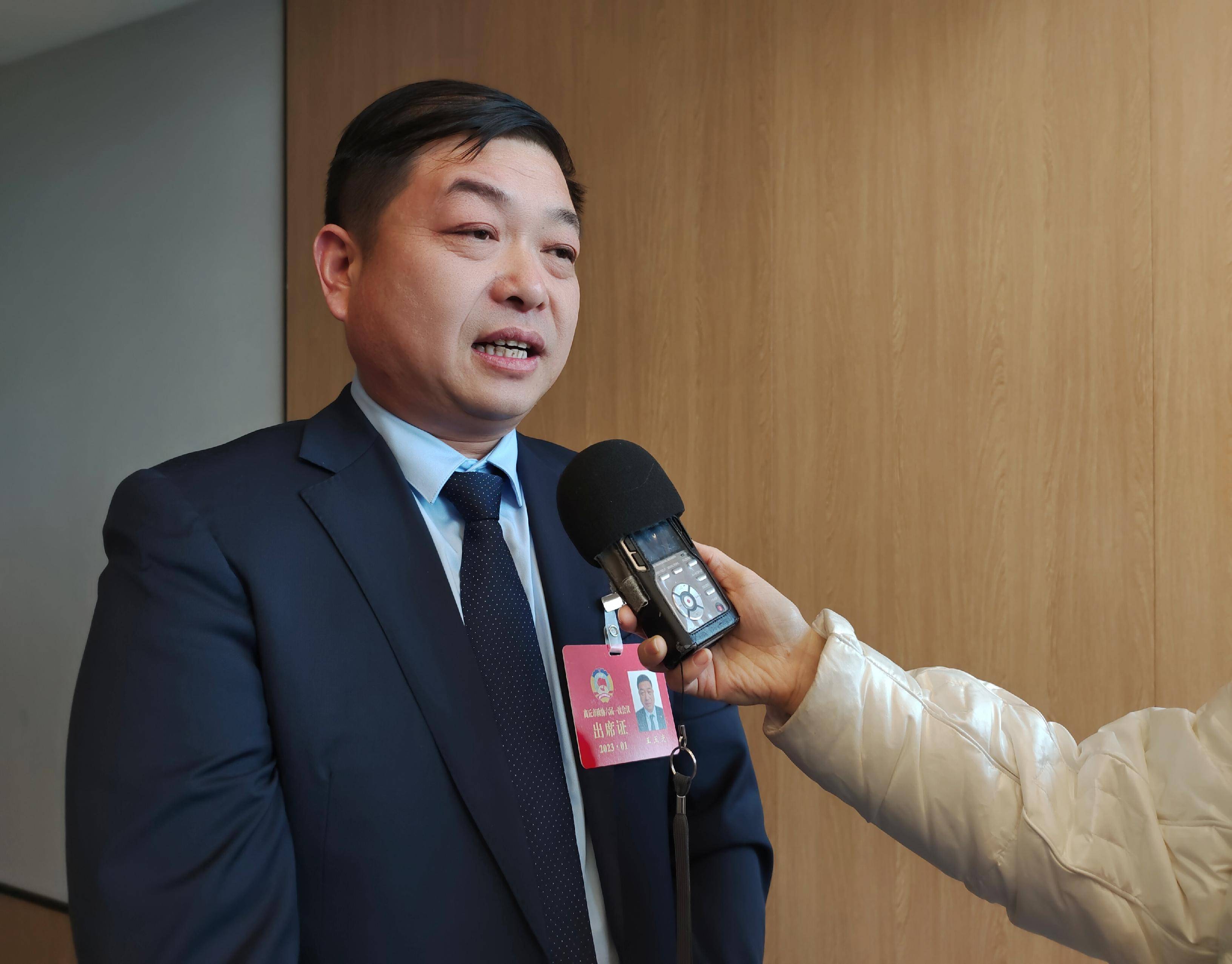 商丘飞达公司董事长王玉光参加政协商丘市第六届委员会第一次会议