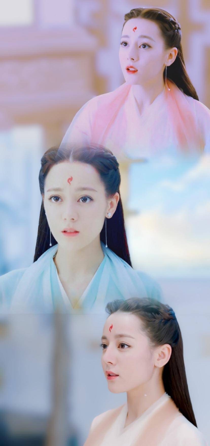九尾红狐,眉间拥有一朵红艳的凤羽花胎记,俏皮可爱,灵动可人.