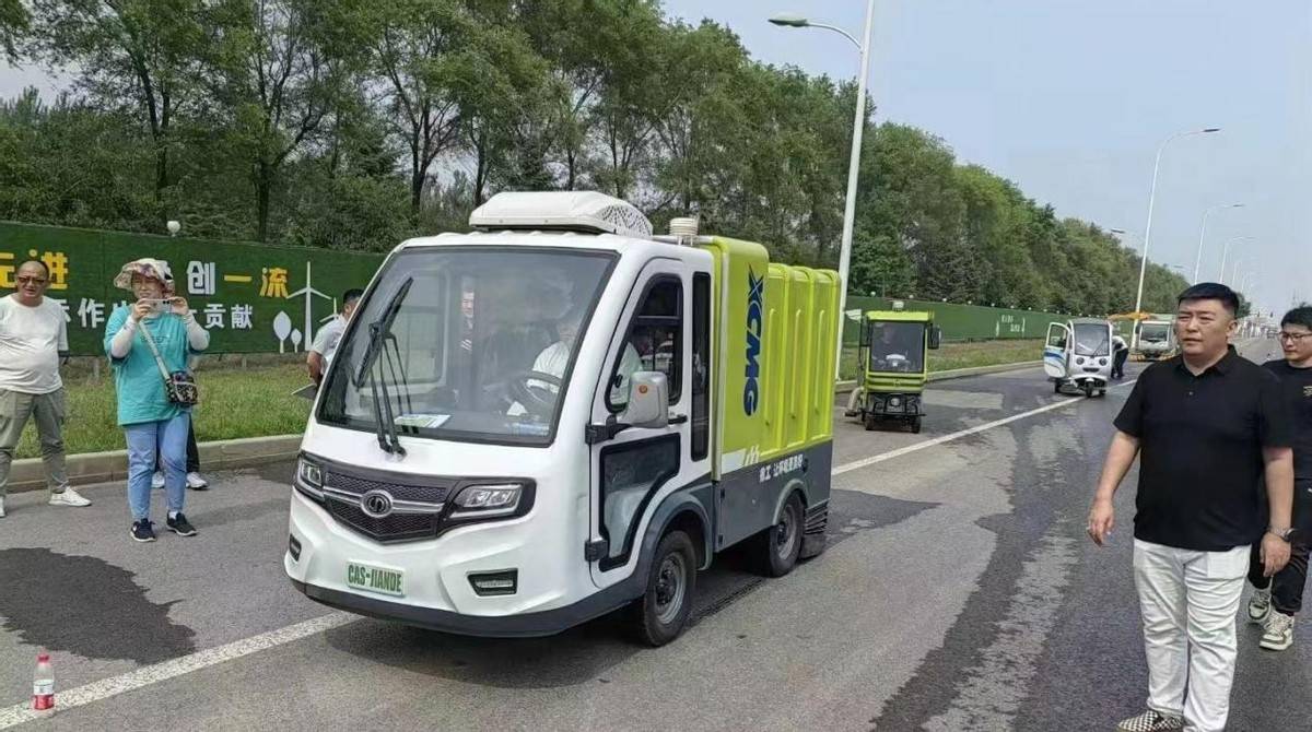 沈阳环卫系统召开新能源车辆现场演示会_企业_作业_城管