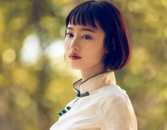 余觉_刺绣_婚姻