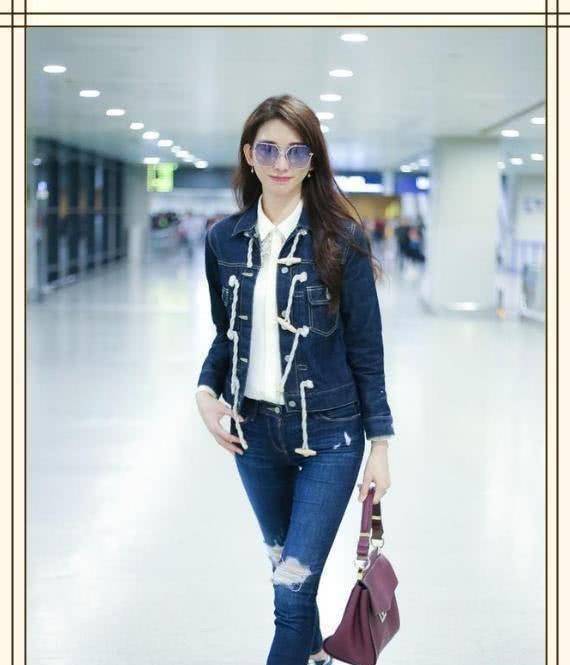 林志玲渐变色的紫色墨镜,穿着牛仔外套,非常的时尚减龄_衣服_很漂亮