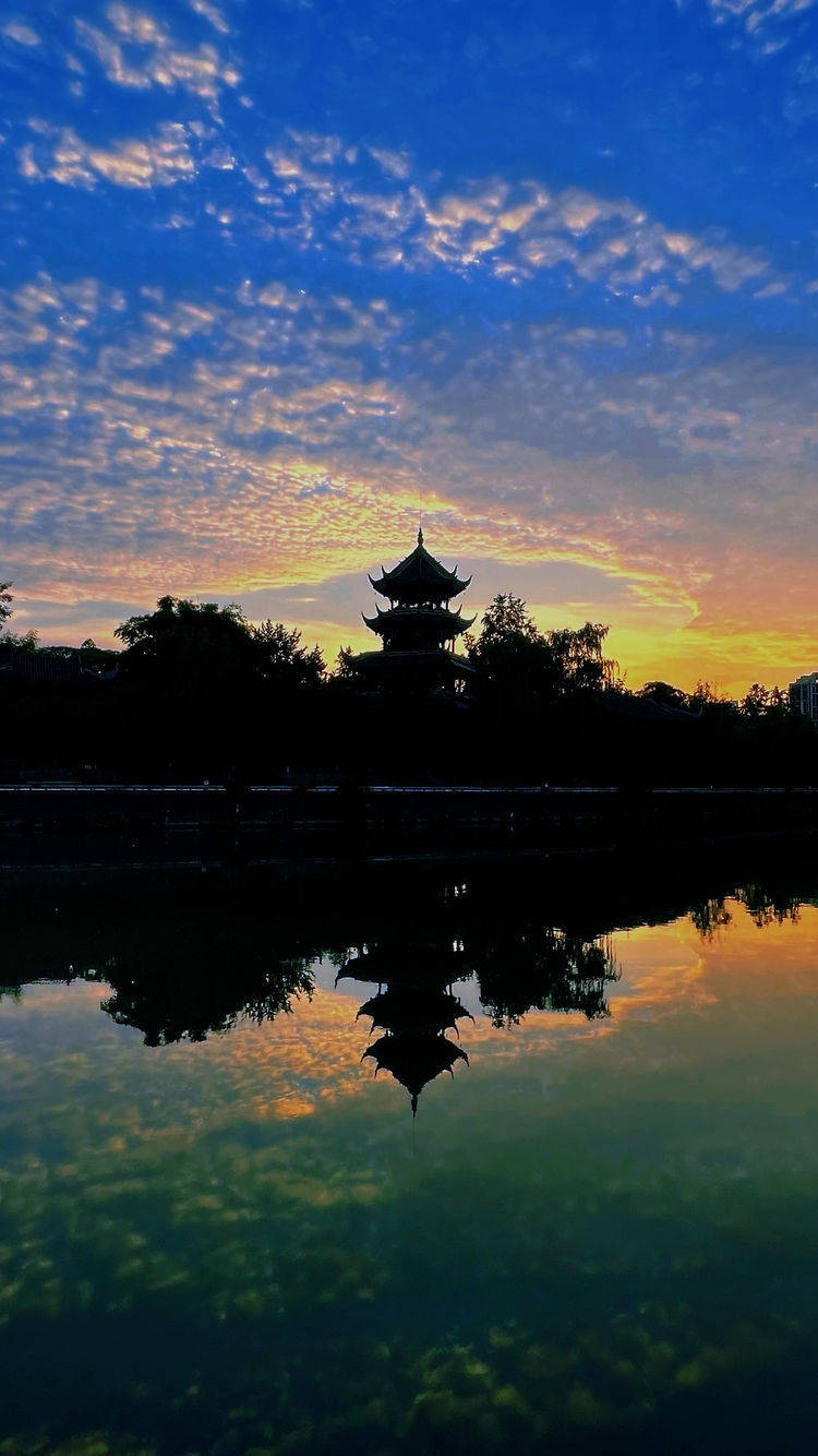 摄影|落日余晖下的成都望江楼_晚霞_天空_锦江