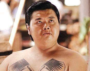 《少林足球》中轻功水上漂的"肥仔聪",周星驰主演的电影《功夫》扮演