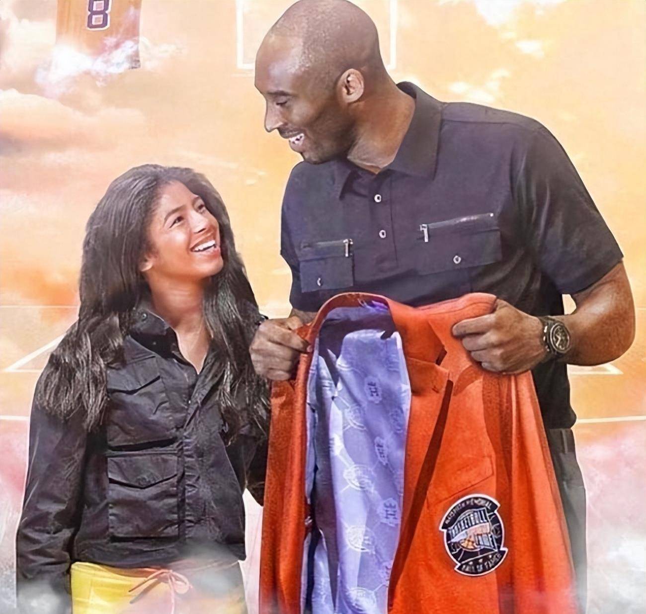 合影中,瓦妮莎和科比紧紧拥抱在一起,眼神中充满了温情和幸福.