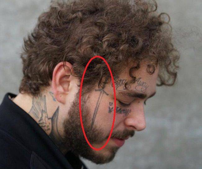 满脸纹身还不够!美国当红嘻哈歌手砸千万镶钻石牙_马龙