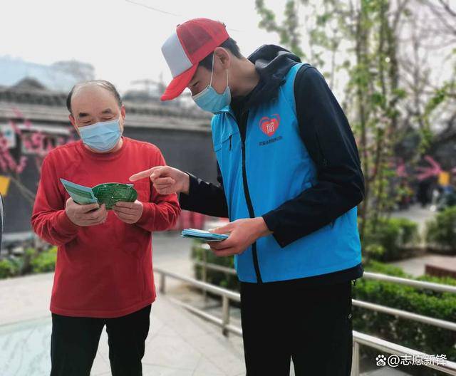 西城区政法委书记缪剑虹与北京冬奥会志愿者植树护绿共建绿色家园