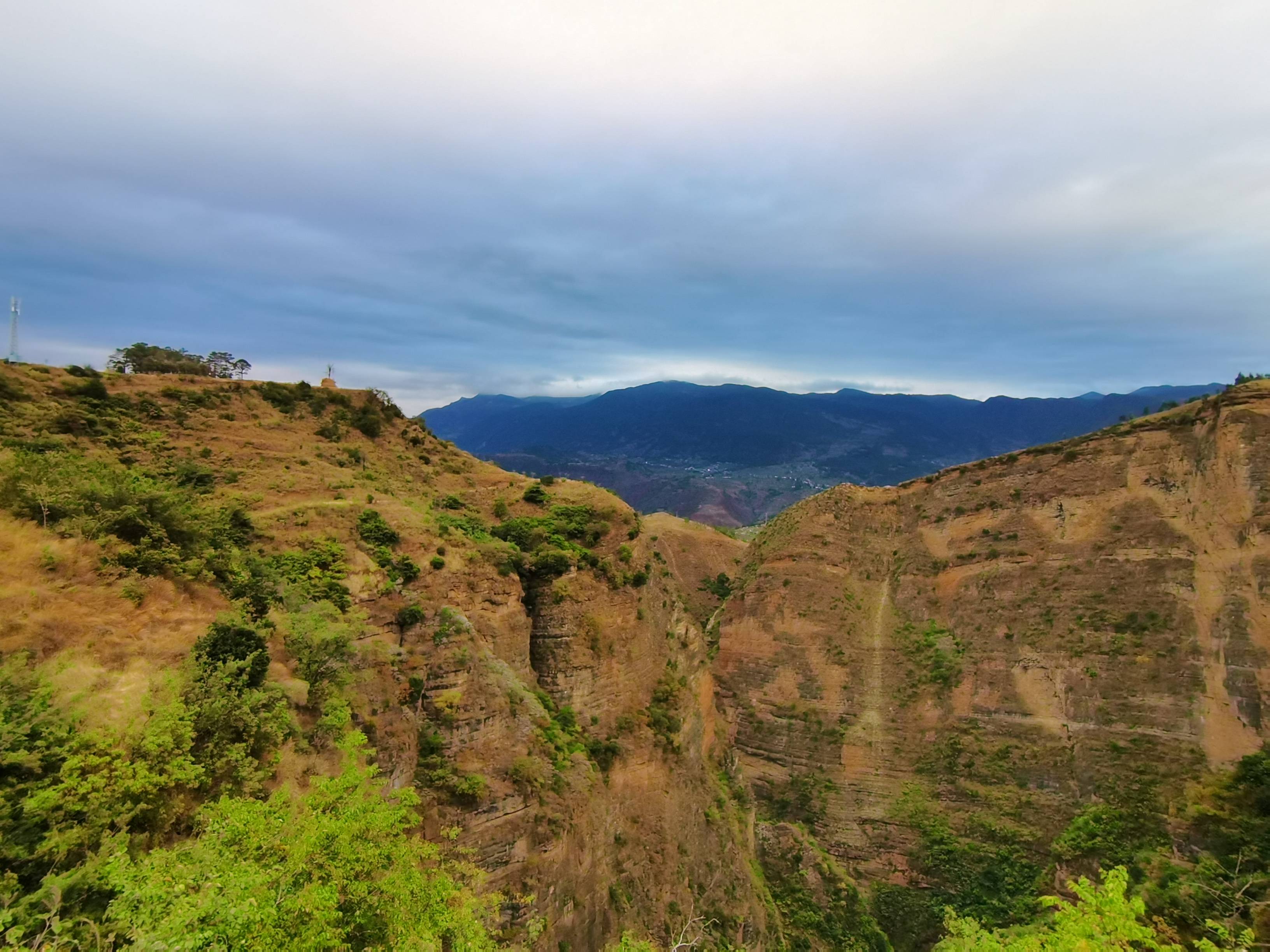 怒江行(一)武定己衣大裂谷_天生桥_村民_伤痕