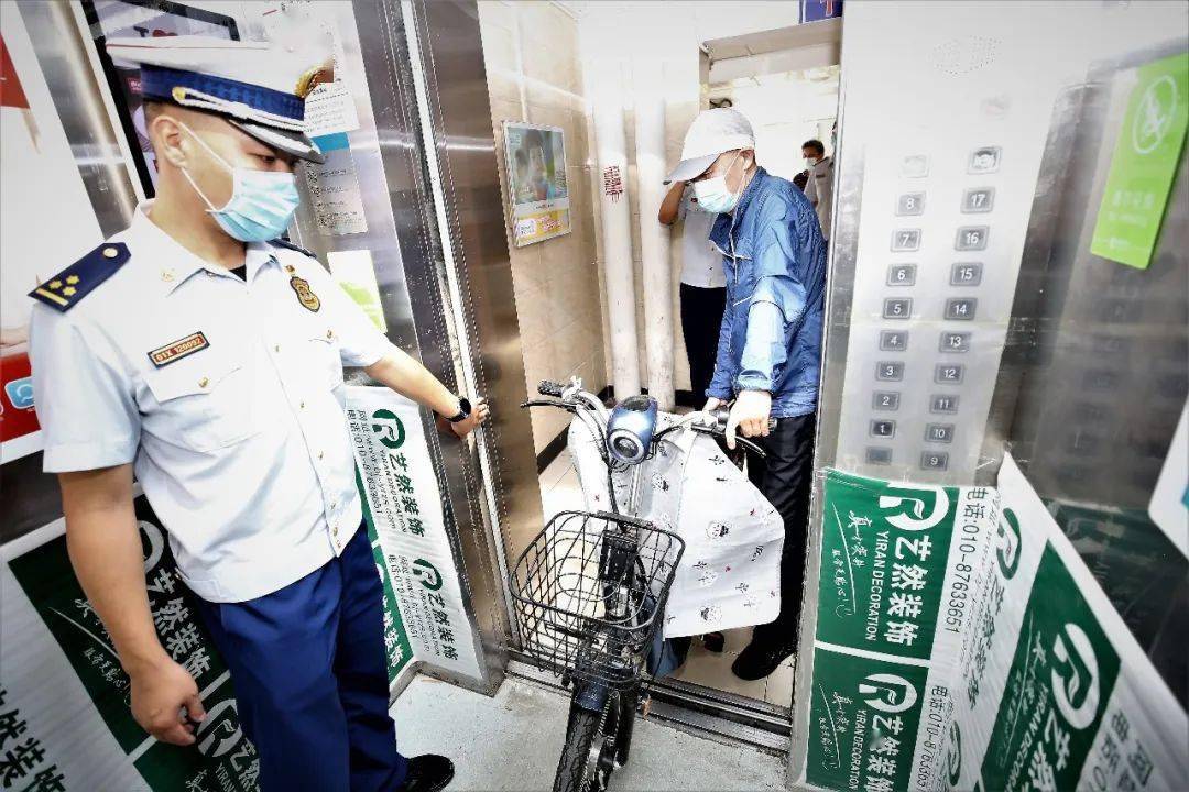 电动车进电梯就告警西城区试点建设电动车禁入楼宇系统