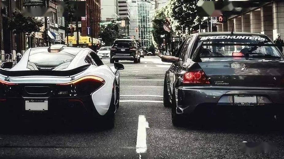 "不是所有车都敢向迈凯伦p1竖中指,如果有,请记住它的名字 evolution"