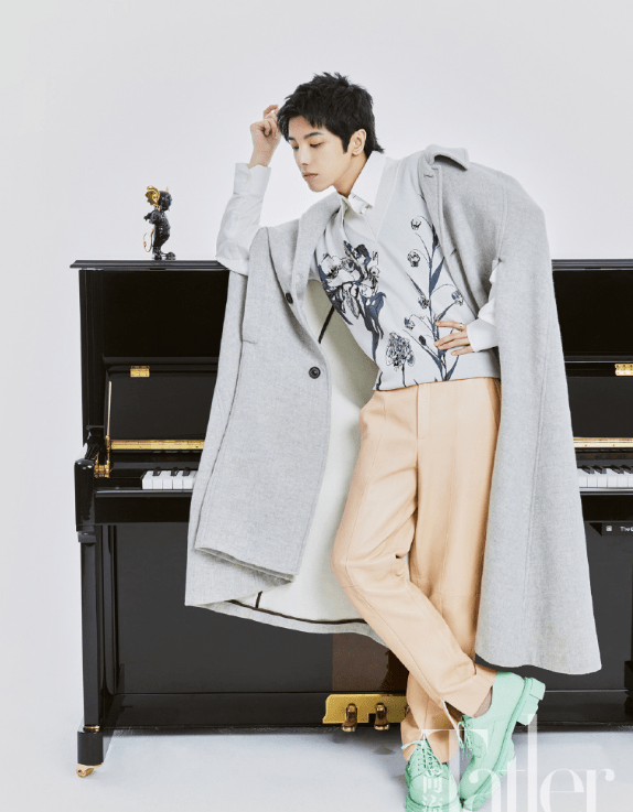 品牌分享华晨宇杂志造型 展现了沉思中的音乐奇才的俏皮一面