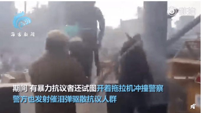 印度十万农民开拖拉机游行（图）