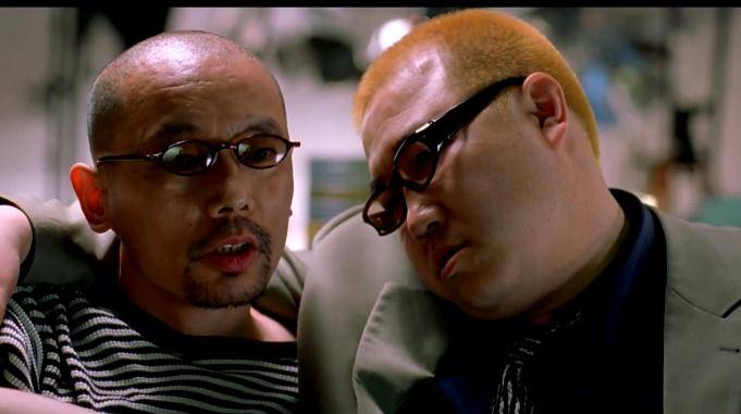 大腕葛优当年和英达合作拍戏英达这造型在当时非常时髦