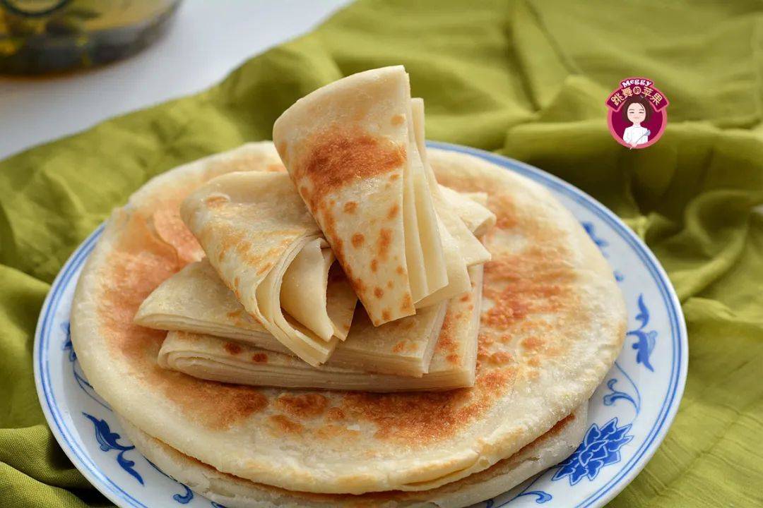 柔软酥香多层饼:饼外皮酥香,内部油香柔软