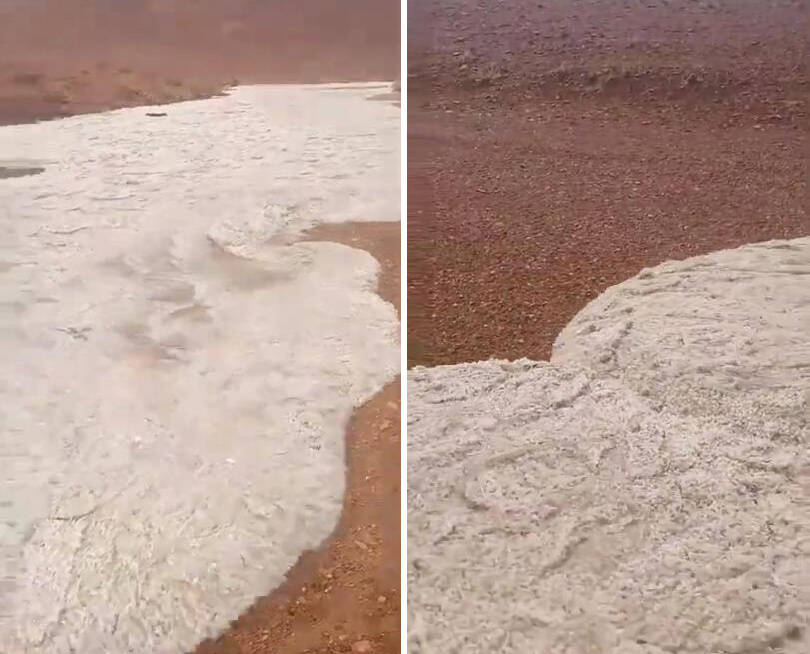 沙特阿拉伯遭遇极端天气冰雹汇集成洪水流过沙漠地带