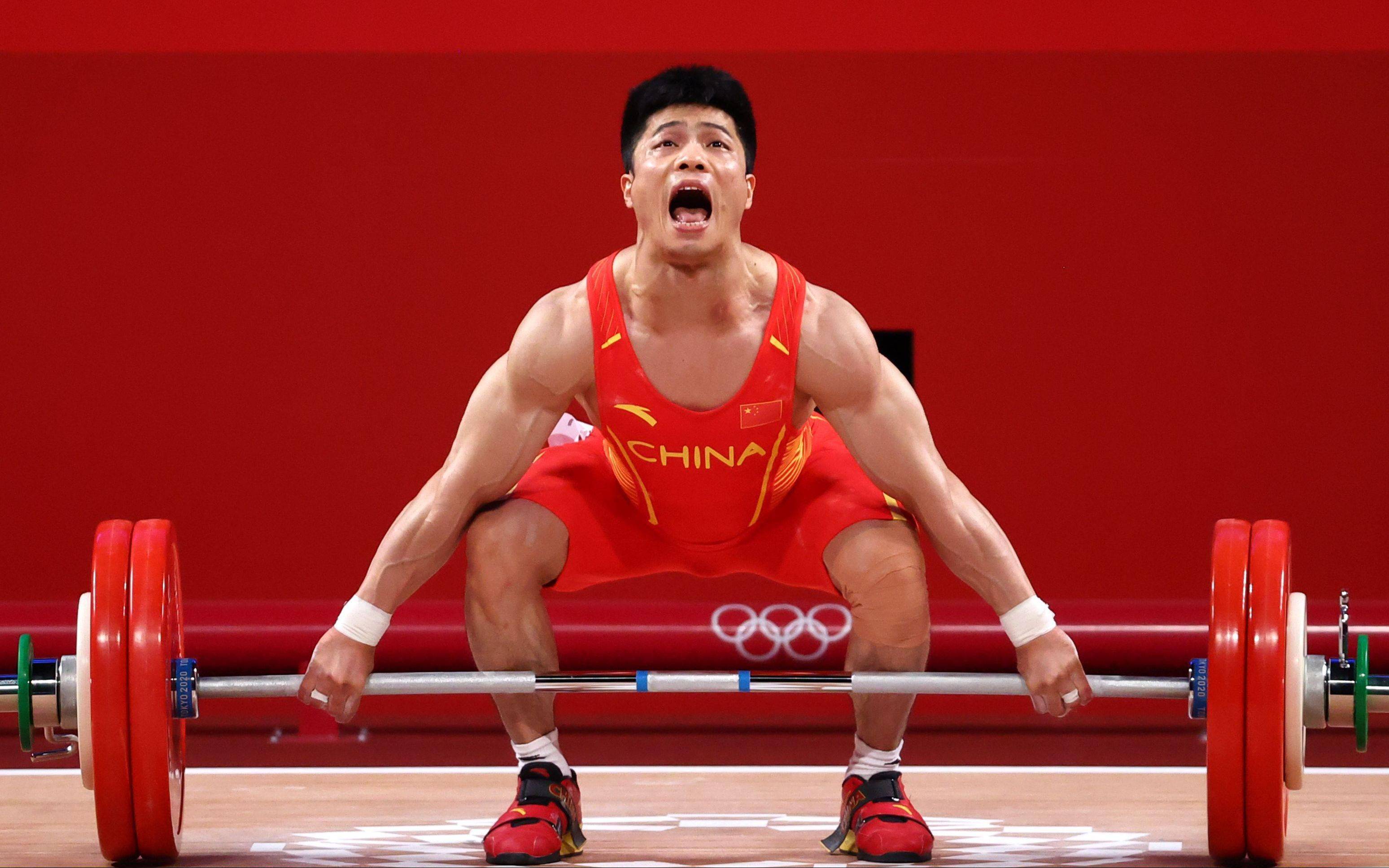 男子第1金李发彬举重男子61公斤级夺冠