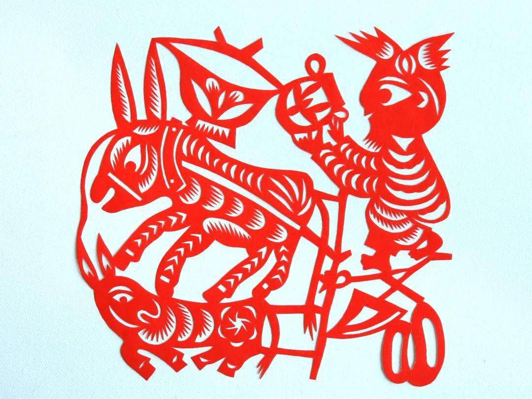 在安塞剪纸的年轻人