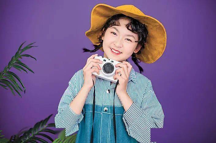 聂耳小学新兴校区六年级(7)班杨维合//////从小学加入玉报小记者团,到