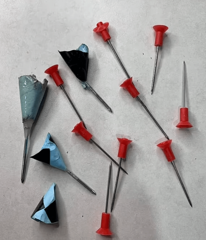 看到这些悉尼被自制的飞镖刺