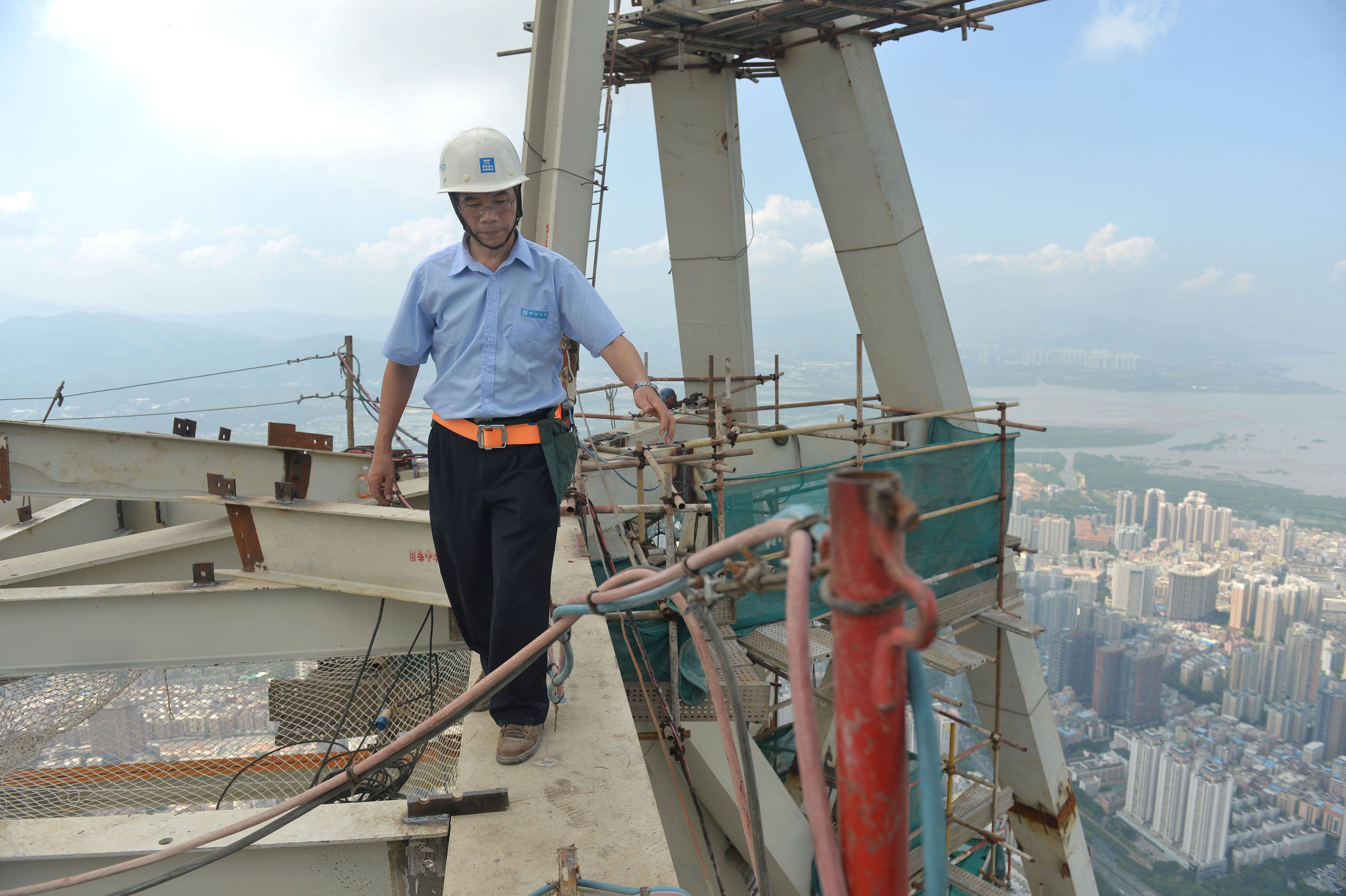 全国劳模陆建新:从百米盖到600米,跟摩天大楼"铆"了40年