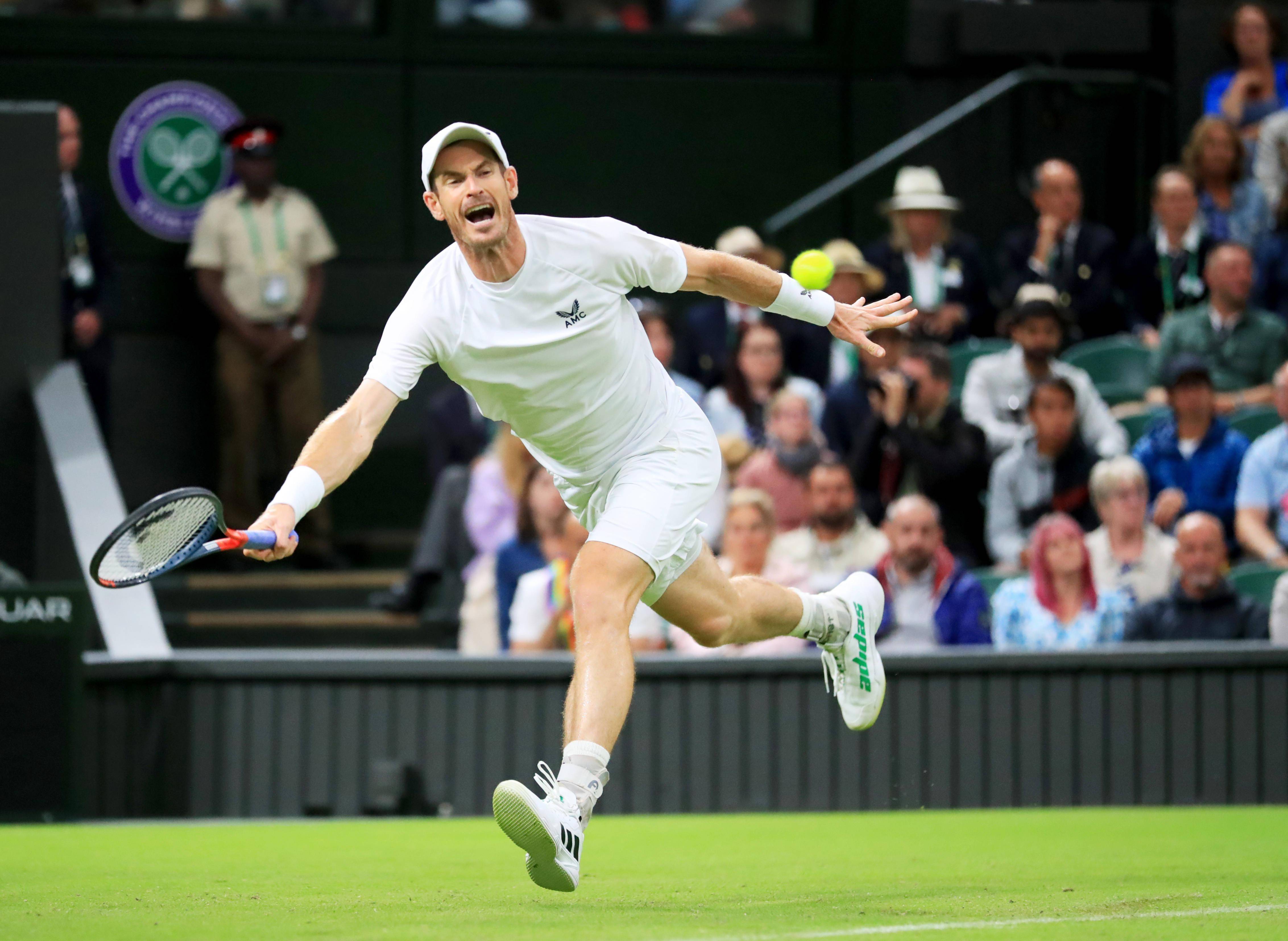 网球——温网:穆雷首轮晋级_伦敦_比赛_新华社